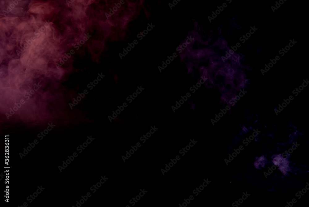 White smoke on a black background. Colored smoke with a blue and red tinge. The texture of scattered smoke. Blank for design. Layout for collages. White smoke on a black background. Colored smoke with a blue and red tinge. The texture of scattered smoke. Blank for design. Layout for collages.