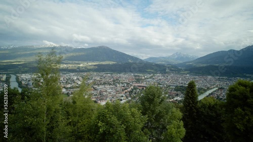 View over Innsburck city with the Austrian alps in the distance photo