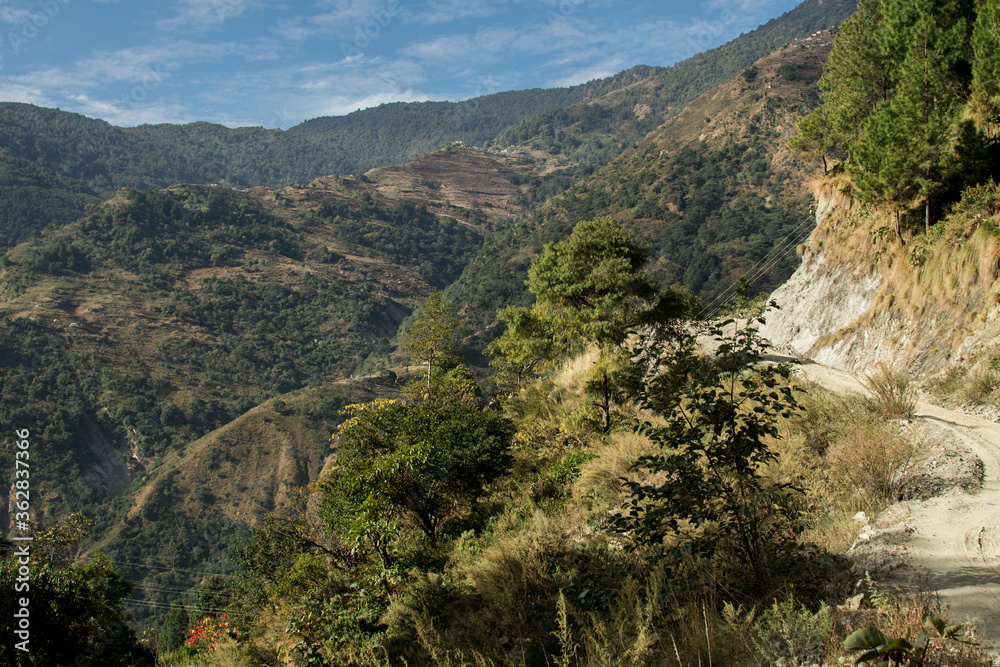 Rolling hills by a dirt road in Annapurna circuit, Nepal