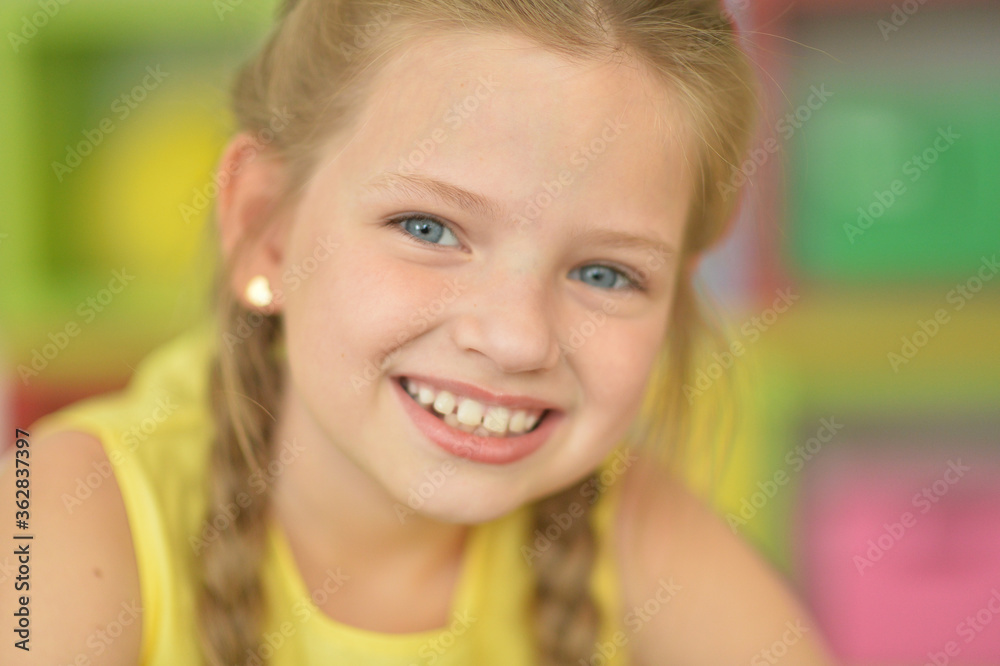 Portrait of cute smiling girl with plaits Portrait of cute smiling girl with plaits