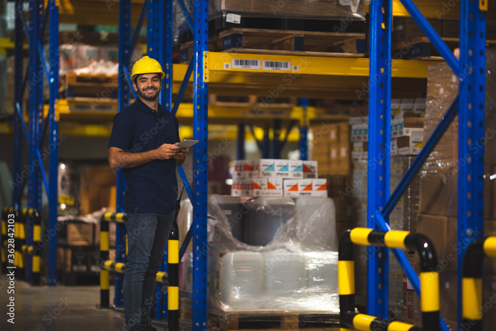 warehouse worker working in storage department, Working at warehouse. warehouse worker working in storage department, Working at warehouse.