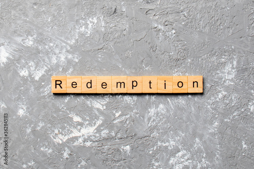 Εκτύπωση καμβά redemption word written on wood block