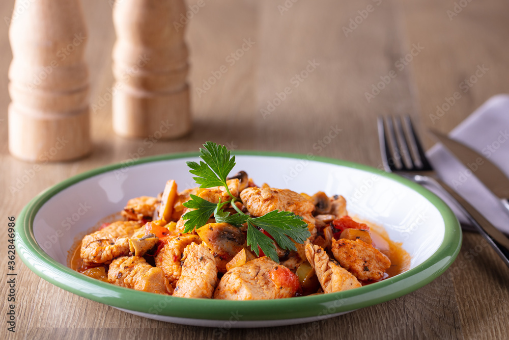 Fototapeta premium Turkish stew with chicken and mushrooms