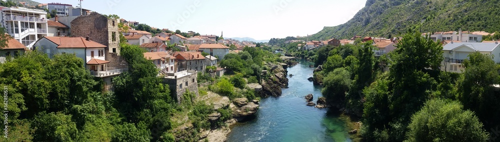 Mostar, a historic town spanning a deep valley of the Neretva River