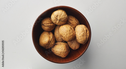 Photos top view shot of walnut on white background.