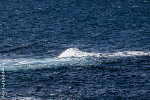 Wave breaking on the ocean.