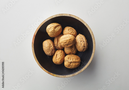 Photos top view shot of walnut on white background.