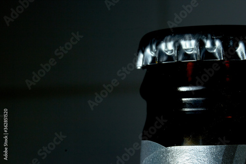 beer bottle cap in macro with black background