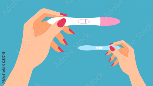 Pregnancy test. Female hand is holding a positive and negative pregnancy test. Isolated on blue background. Motherhood, pregnancy, birth control concept. Modern illustration. photo