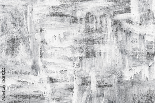 Fotografie Smudged white paint pattern on the wall