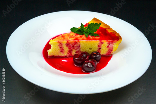 Cottage cheese casserole decorated with cherries