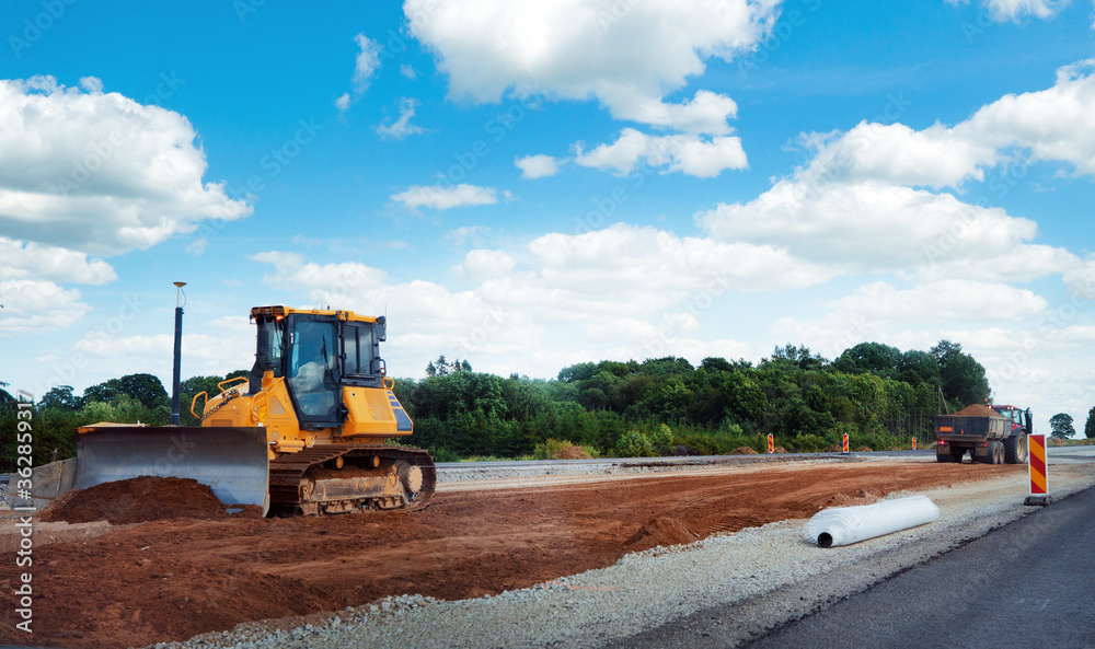 Heavy equipment works in the air. Road reconstruction Heavy equipment works in the air. Road reconstruction