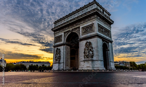 The Arc de Triomphe de l'Étoile ("Triumphal Arch of the Star") is one of the most famous monuments in Paris, France, standing at the western end of the Champs-Élysées. © Ondrej Bucek