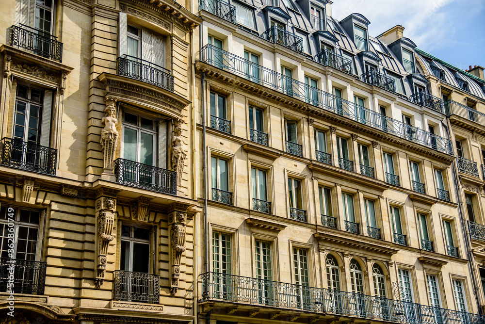 A typical parisian facade of a residential building in the center of the Paris. 