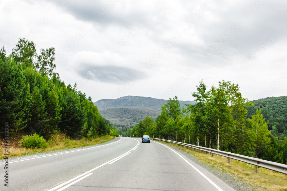 Fototapeta premium View from a moving car on a road