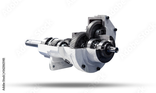 Gear reducer isolated on white. Gearwheels speed reducer cross section.