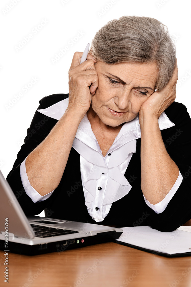 Portrait of elderly woman working with laptop Portrait of elderly woman working with laptop
