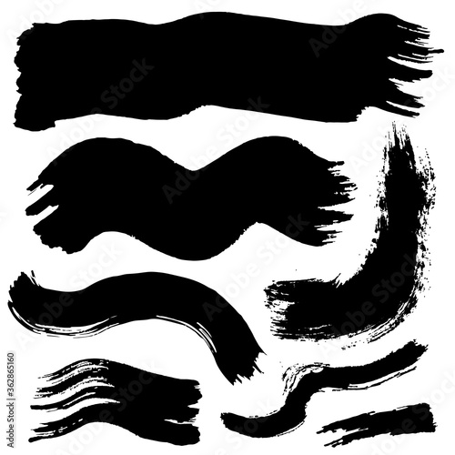 Black ink stroke. Grungy brush. Collection of black smears
