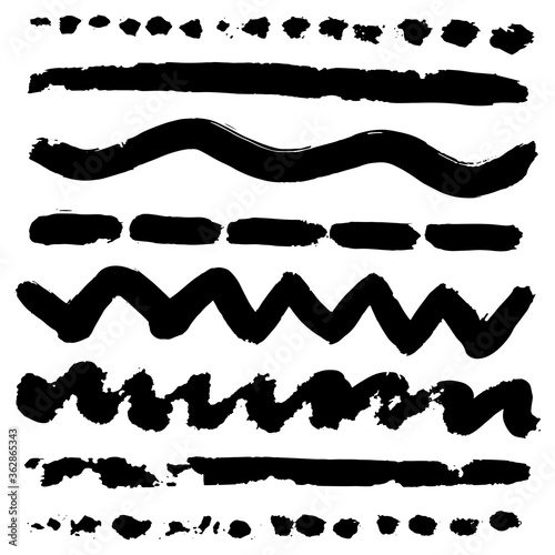 Set of grungy lines. Ink brushes. Grungy design elements