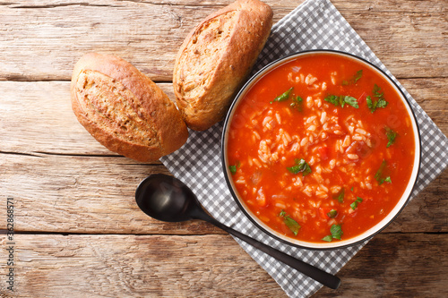 Konstfotografi Thick vegetarian tomato soup with rice close-up in a bowl on the table