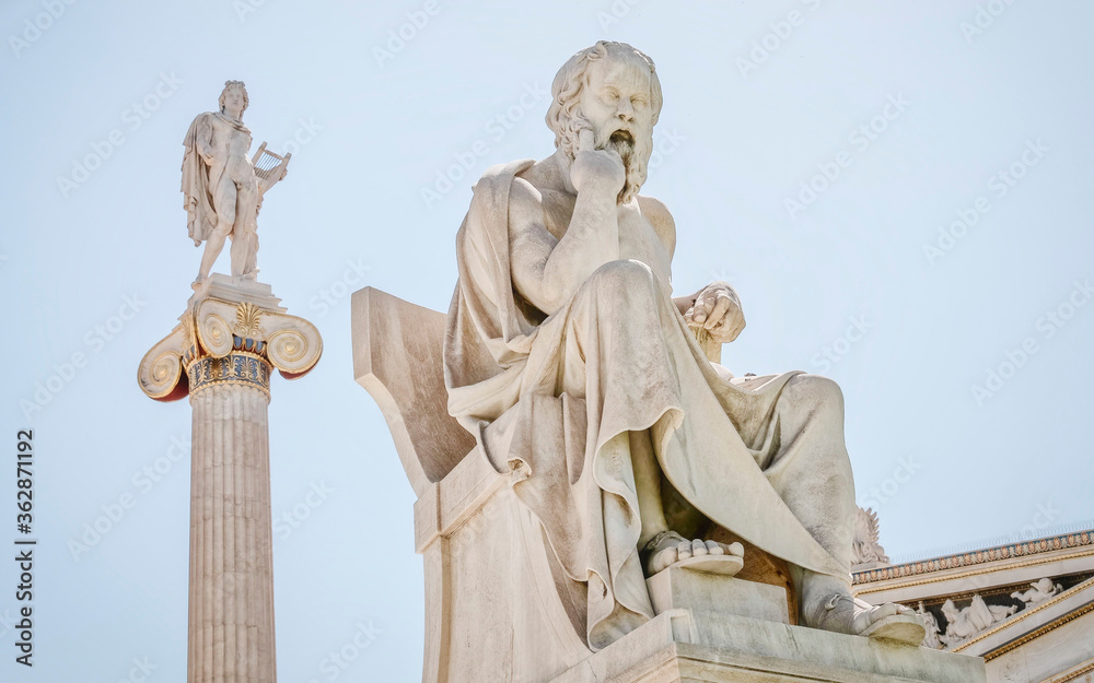 Socrates the philosopher and Apollo god of the arts marble statues, Athens Greece