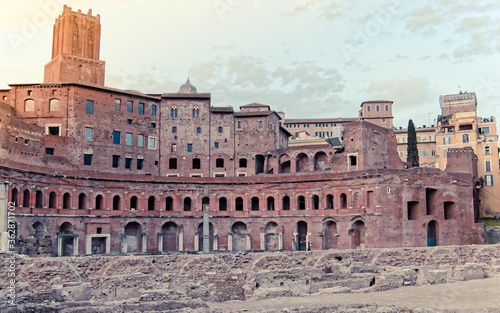 golden hour in Rome Italy  the Trajan s forum and market view with militias tower on the background