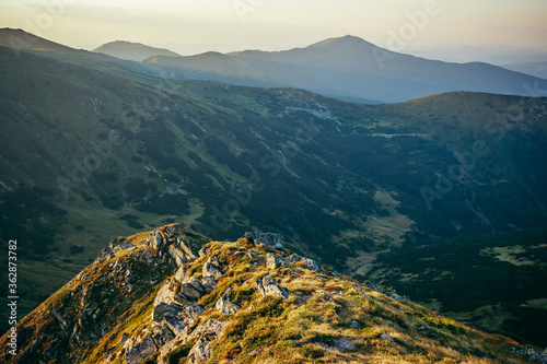 A view of a large mountain in the background