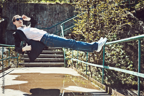 A young hipster defies gravity
