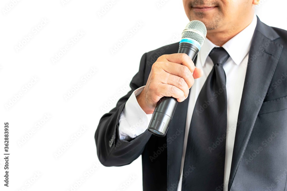 The elegant entertaine talking man holding microphone. The elegant entertaine talking man holding microphone.