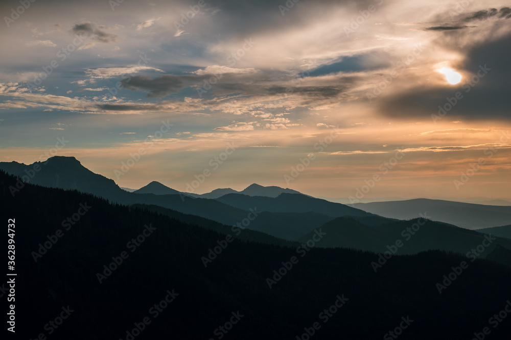 Scenic lanscape view of beautiful mountains on sunset at dusk. Rysy mountains, Hight Tatry, Poland
