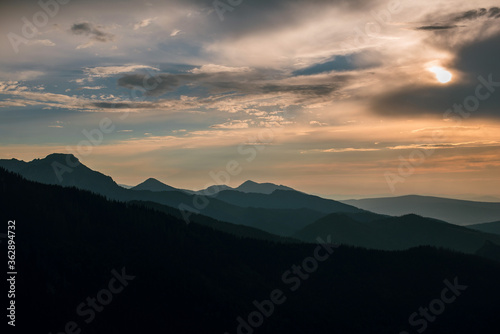 Scenic lanscape view of beautiful mountains on sunset at dusk. Rysy mountains, Hight Tatry, Poland