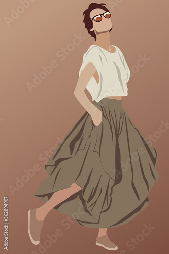 Short haired glamorous brunette dressed in brown long skirt, shoes, sunglasses and white t-shirt. Showing her style