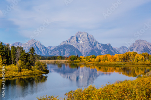The Grand Teton at autumn time, with a reflection in the snake river.
