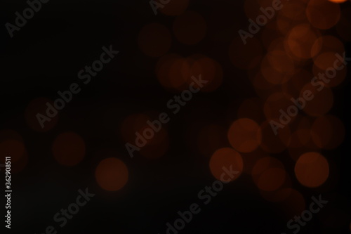 Gold abstract bokeh background, Festive xmas abstract background with bokeh defocused lights and stars © Konkhay