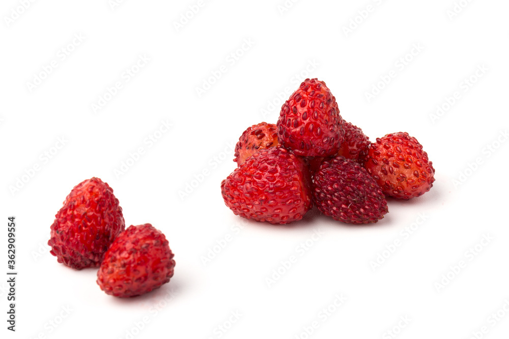 Macro view wild strawberry on white background. Forest red berries Macro view wild strawberry on white background. Forest red berries