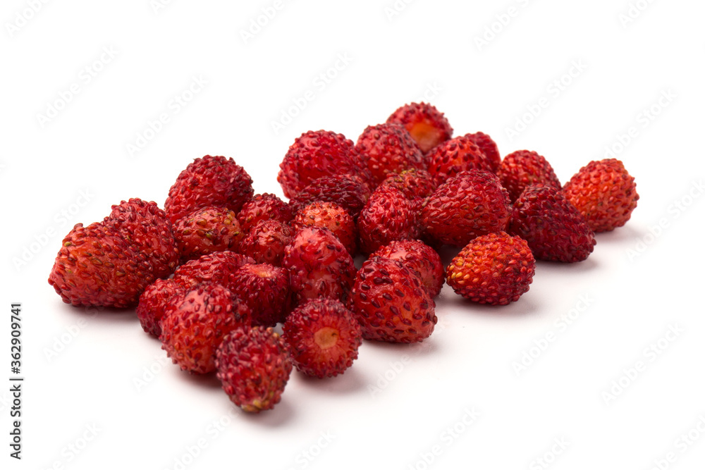 Macro view wild strawberry on white background. Forest red berries Macro view wild strawberry on white background. Forest red berries