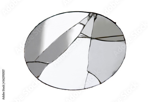Oval broken mirror isolated on white background. Studio shot,clipping path.