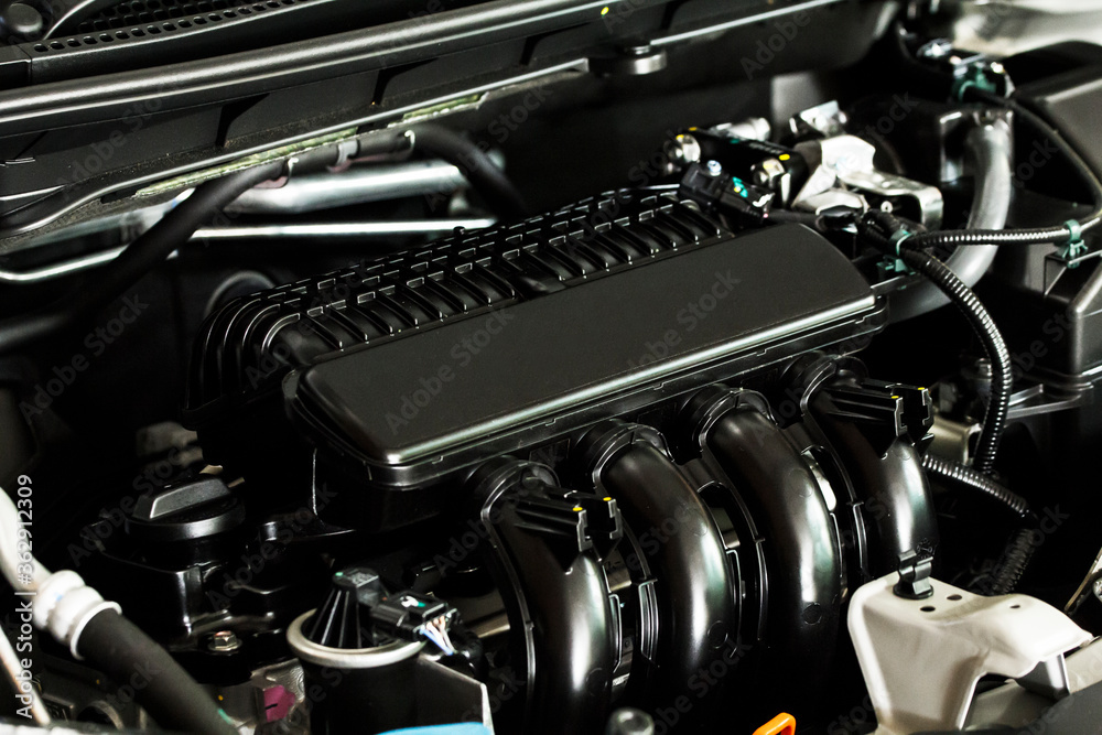 A black car engine 4 cylinder A black car engine 4 cylinder