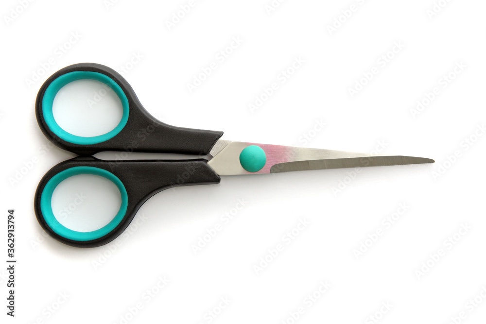 Small scissors isolated on white background. Studio shot Small scissors isolated on white background. Studio shot