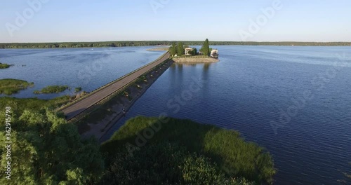 Aerial view to old pumping station on dam photo