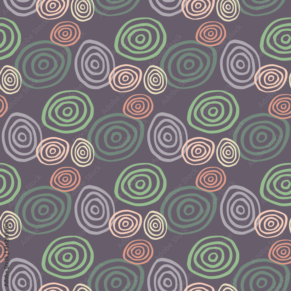 Abstract pattern in dark pastel tones. Purple background and green, blue and pink spirals. Abstract pattern in dark pastel tones. Purple background and green, blue and pink spirals.