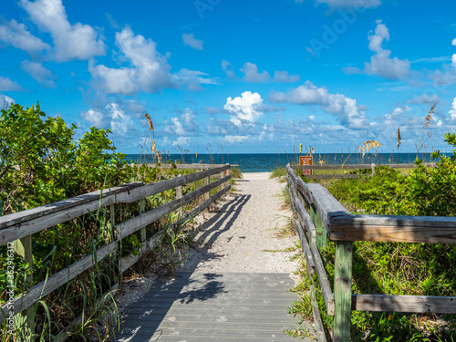Fototapeta Naklejka Na Ścianę i Meble -  Walkway to beach in Stump Pass State Park on the Gulf of Mexico in Englewood  in Southwest Florida