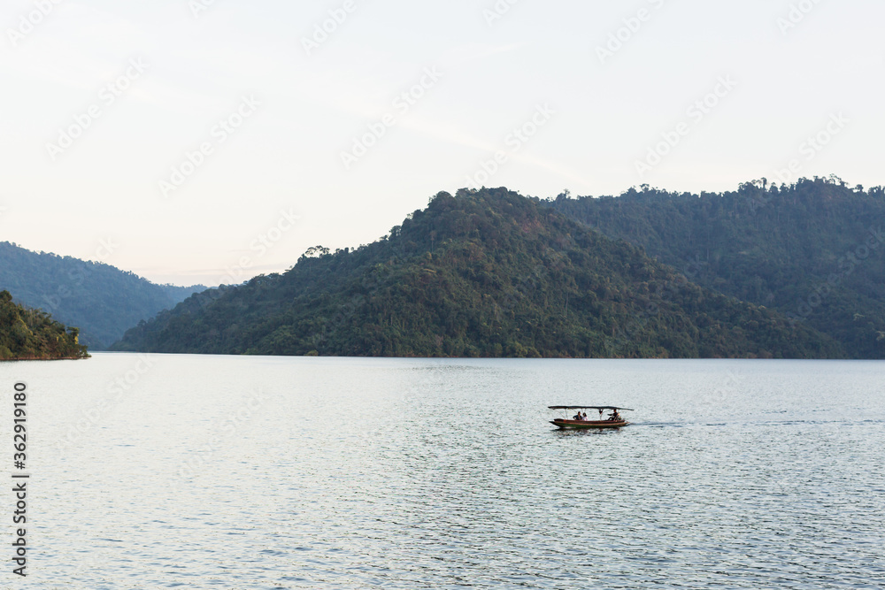 Long tail boat is popular tourists enjoy the beauty of the nature in Khun Dan Prakan Chon Dam Nakhon Nayok Thailand Long tail boat is popular tourists enjoy the beauty of the nature in Khun Dan Prakan Chon Dam Nakhon Nayok Thailand
