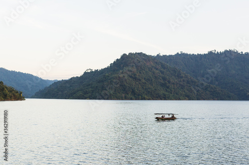 Long tail boat is popular tourists enjoy the beauty of the nature in Khun Dan Prakan Chon Dam Nakhon Nayok Thailand