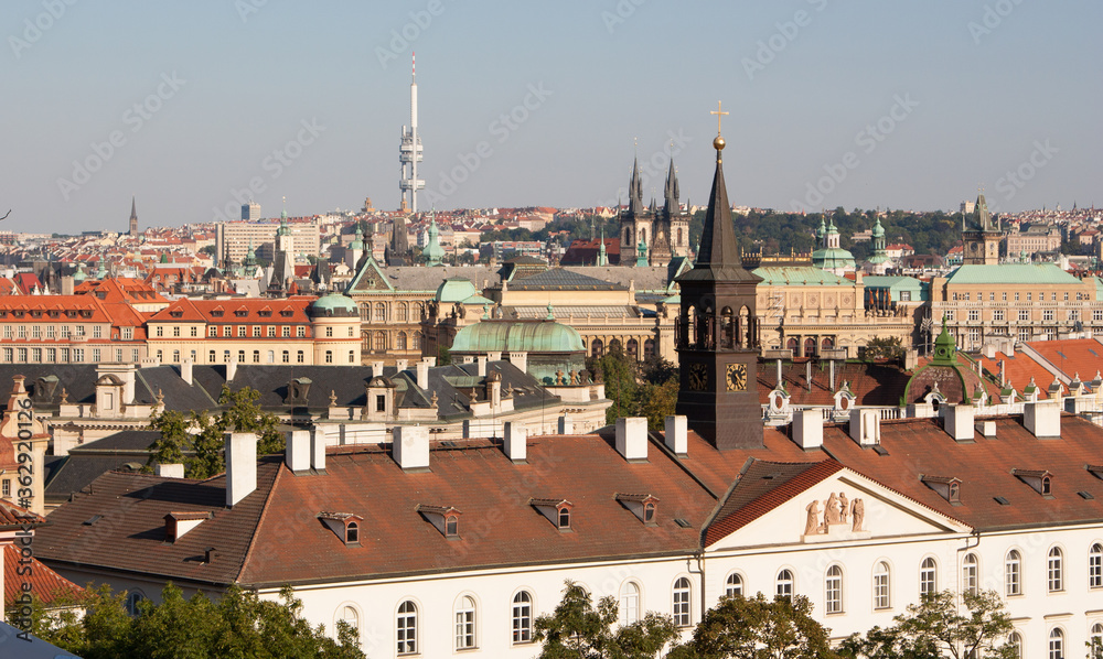 
Panoramic view of the roofs in Prague from red tiles on a sunny day general plan.