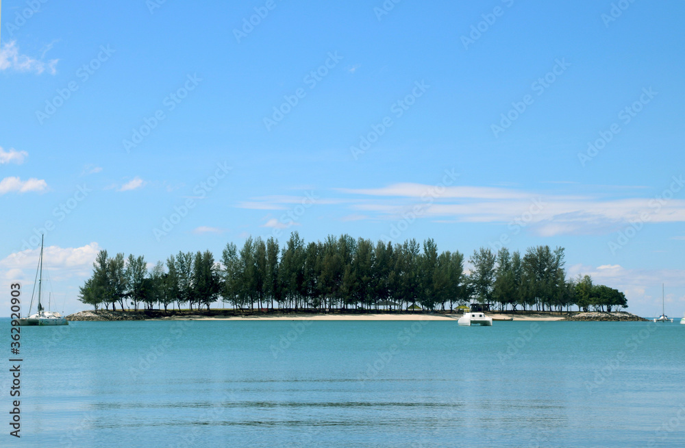 landscape view small island with boats in sea near Tanjung Rhu Beach, Langkawi Island, Malaysia