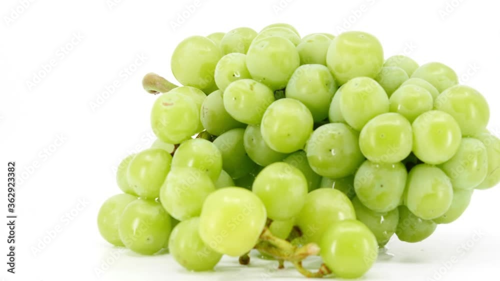 fresh green grapes fruit on white background, video footage. fresh green grapes fruit on white background, video footage.