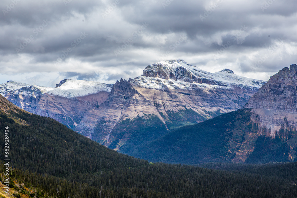 The mountains in Glacier National Park, in Montana, on a cloudy day.