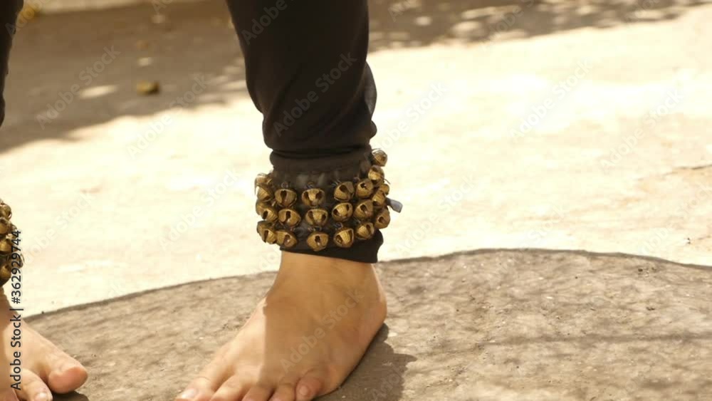 Bharatanatyam Indian classical dance move, closeup of feet rotation shot