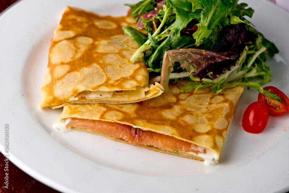 Crepes. Classic traditional French bistro breakfast or brunch cuisine like a thin pancake. Crepes. Classic traditional French bistro breakfast or brunch cuisine like a thin pancake.